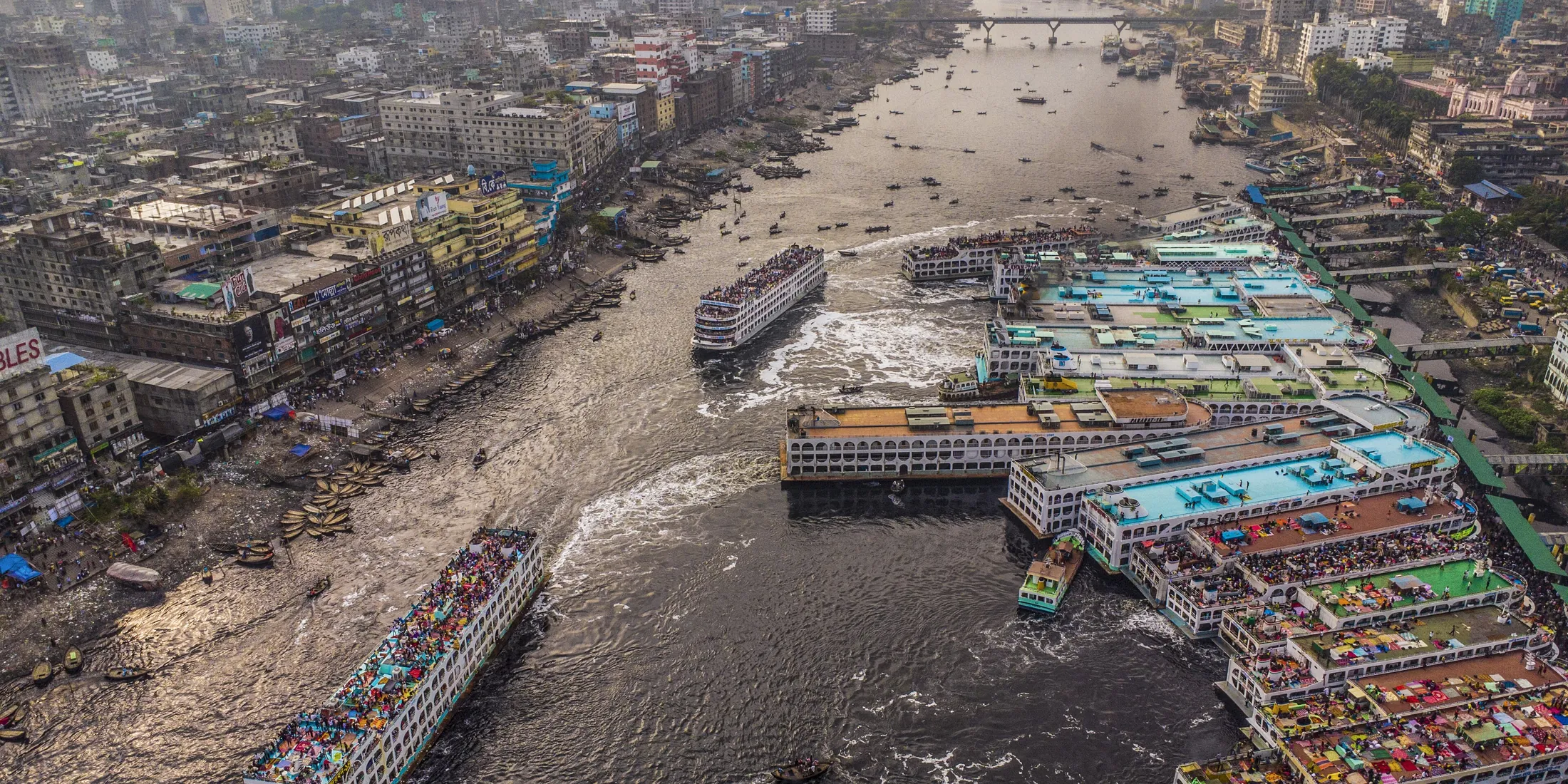 Aerial view of launches crowded along the river terminal in Dhaka